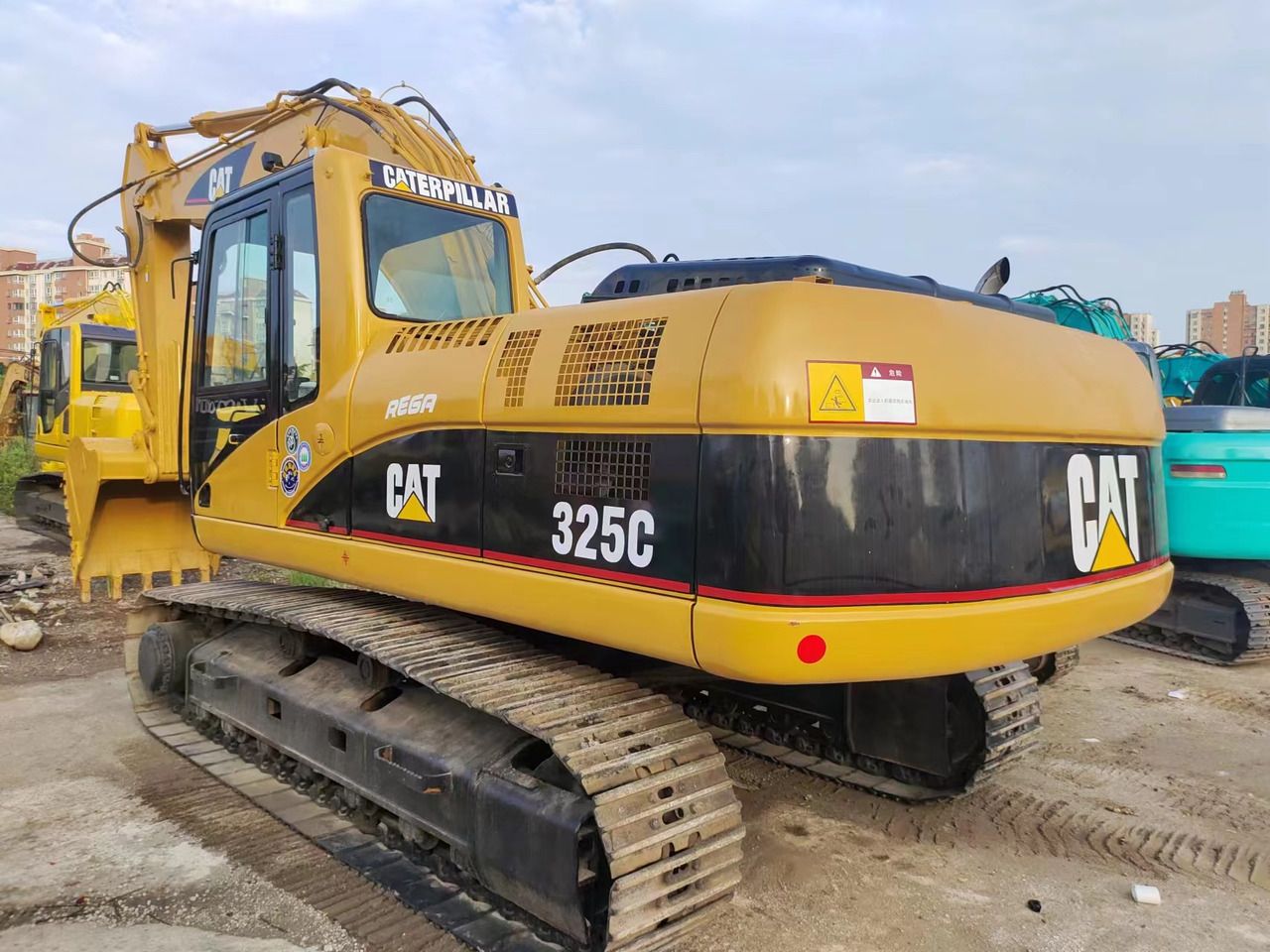 2018 Caterpillar 325C crawler excavator, rear three-quarter view 2018 Caterpillar 325C crawler excavator, rear three-quarter view