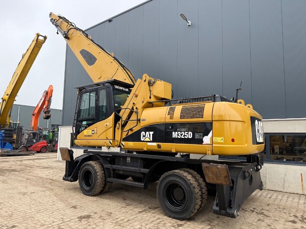 2008 Caterpillar M325D MH material handler, rear three-quarter view