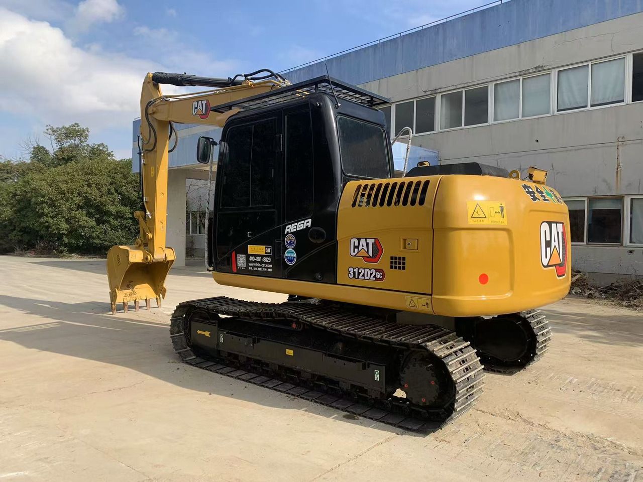 Caterpillar 312D2GC crawler excavator, rear three-quarter view