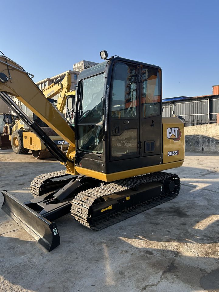 2023 Caterpillar 305.5E2 mini excavator, side view 2023 Caterpillar 305.5E2 mini excavator, side view
