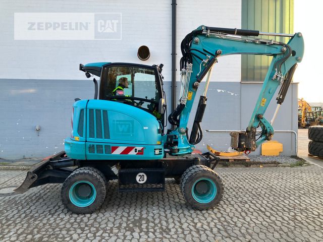 2019 Wacker Neuson ZM70 wheel excavator, side view 2019 Wacker Neuson ZM70 wheel excavator, side view