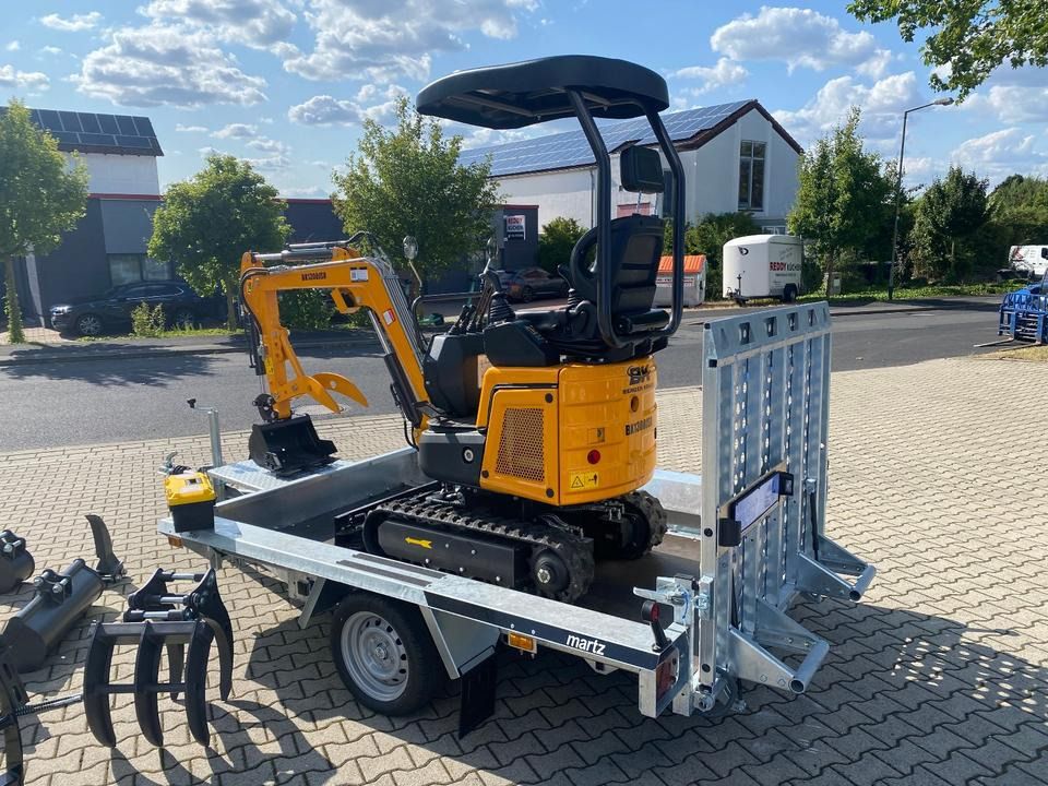 Berger Kraus BK1300JSR mini excavator on trailer, rear three-quarter view Berger Kraus BK1300JSR mini excavator on trailer, rear three-quarter view