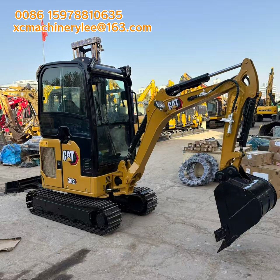 2025 Caterpillar 302 mini excavator, side view 2025 Caterpillar 302 mini excavator, side view