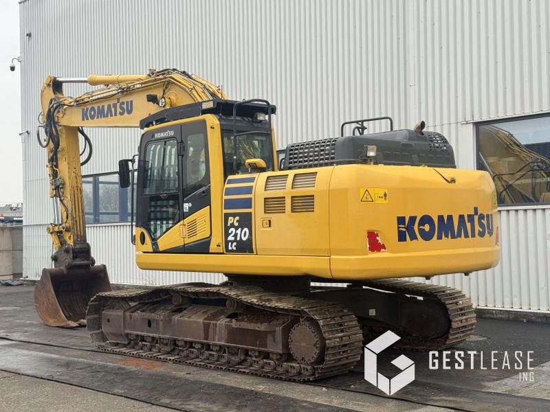 2018 Komatsu PC210LC-11 crawler excavator, rear three-quarter view 2018 Komatsu PC210LC-11 crawler excavator, rear three-quarter view