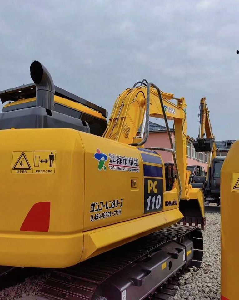 2024 Komatsu PC110 crawler excavator, rear three-quarter view 2024 Komatsu PC110 crawler excavator, rear three-quarter view