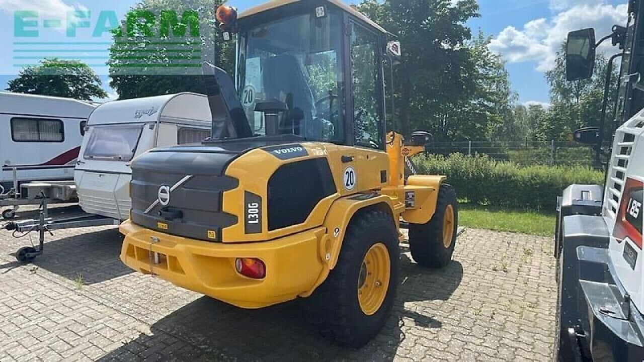 2023 Volvo L30G wheel loader, rear three-quarter view 2023 Volvo L30G wheel loader, rear three-quarter view