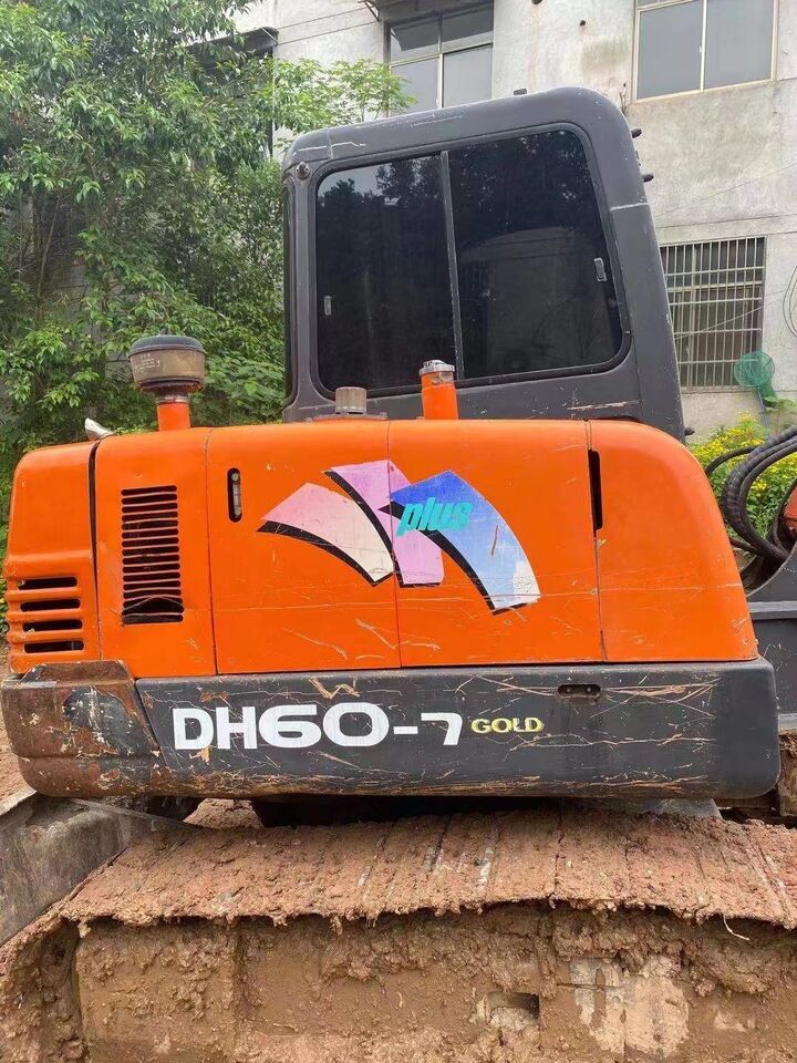 2024 Doosan DH60-7 Gold mini excavator side view 2024 Doosan DH60-7 Gold mini excavator side view