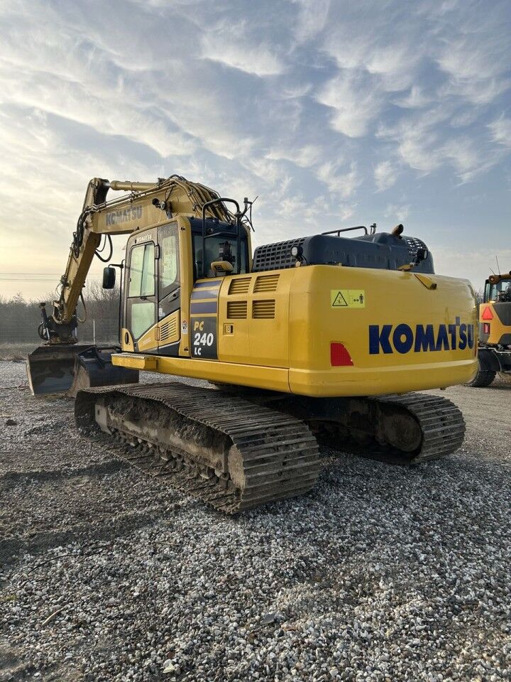 2021 Komatsu PC240LC-11 crawler excavator, rear three-quarter view 2021 Komatsu PC240LC-11 crawler excavator, rear three-quarter view