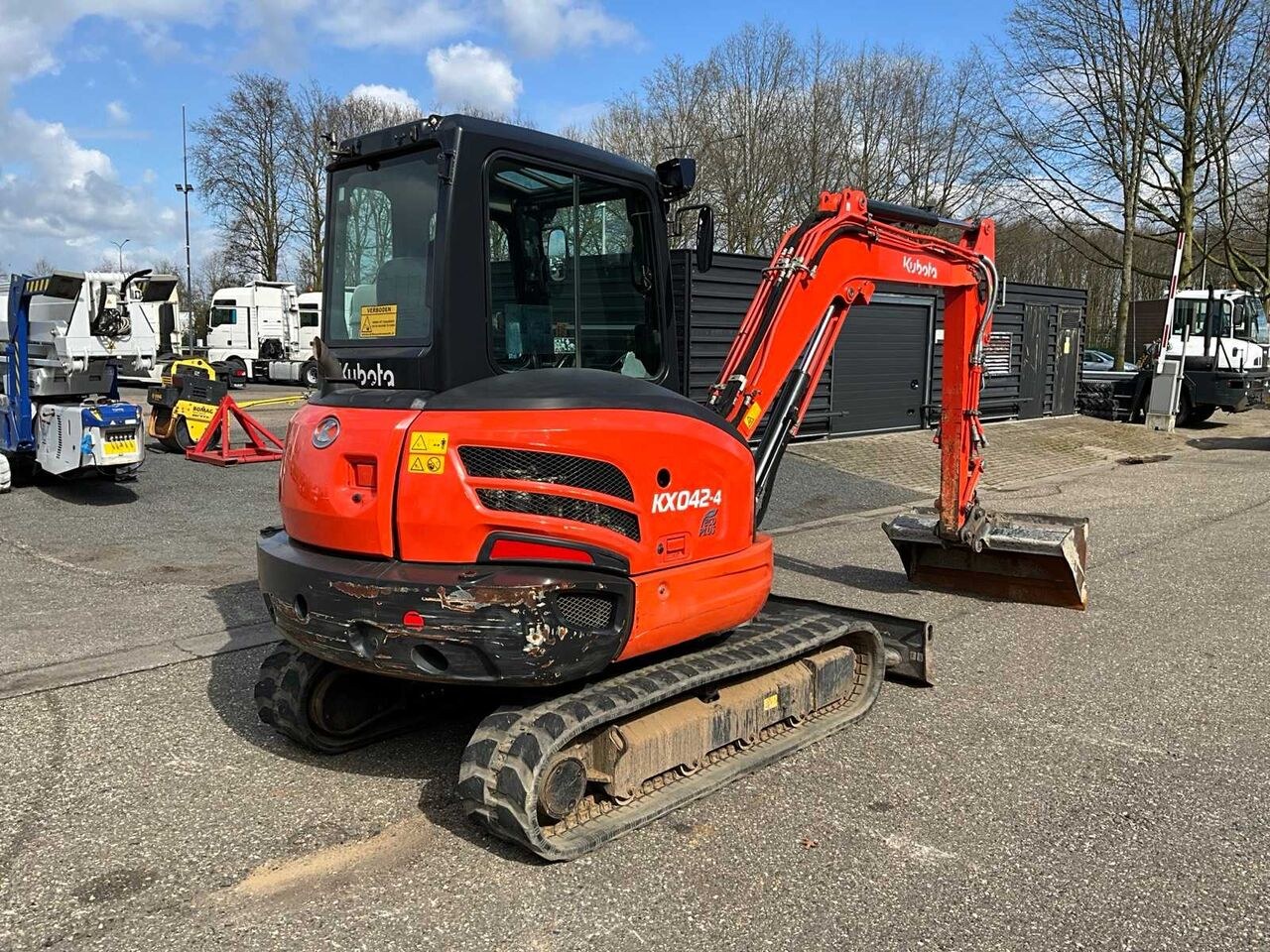 2018 Kubota KX042-4 mini excavator, rear three-quarter view 2018 Kubota KX042-4 mini excavator, rear three-quarter view