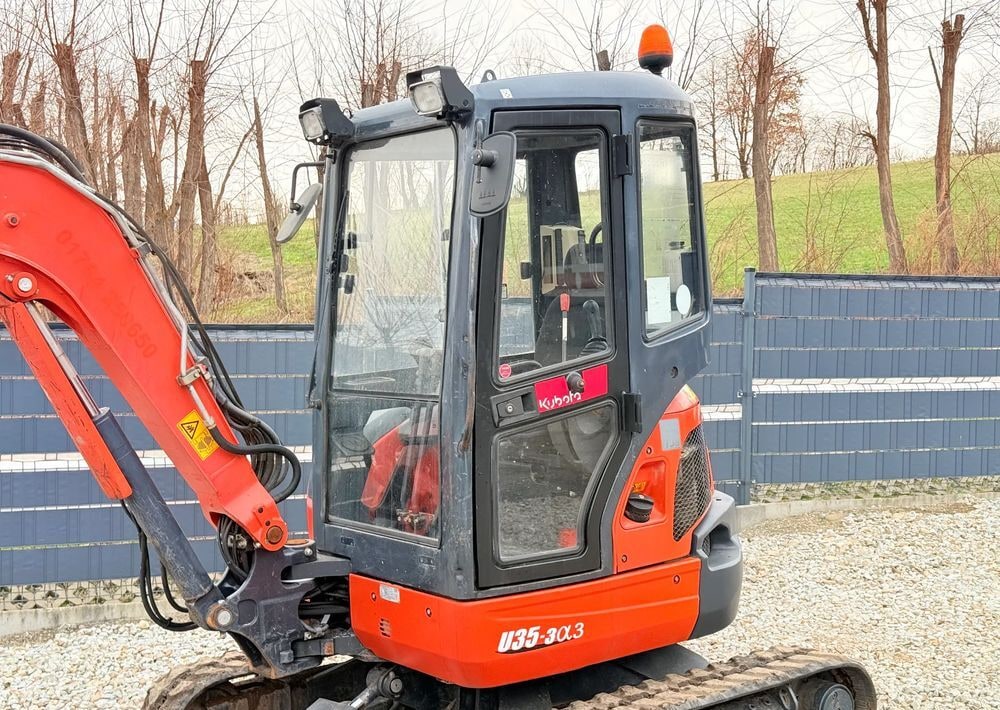 2015 Kubota U35-3α3 mini excavator, side view of cab