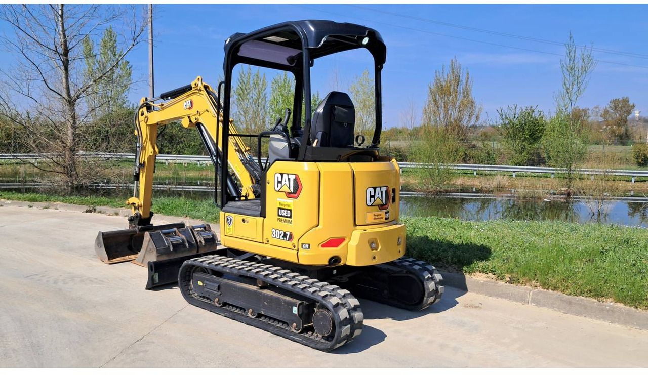 2023 Caterpillar 302.7 crawler excavator, rear three-quarter view 2023 Caterpillar 302.7 crawler excavator, rear three-quarter view
