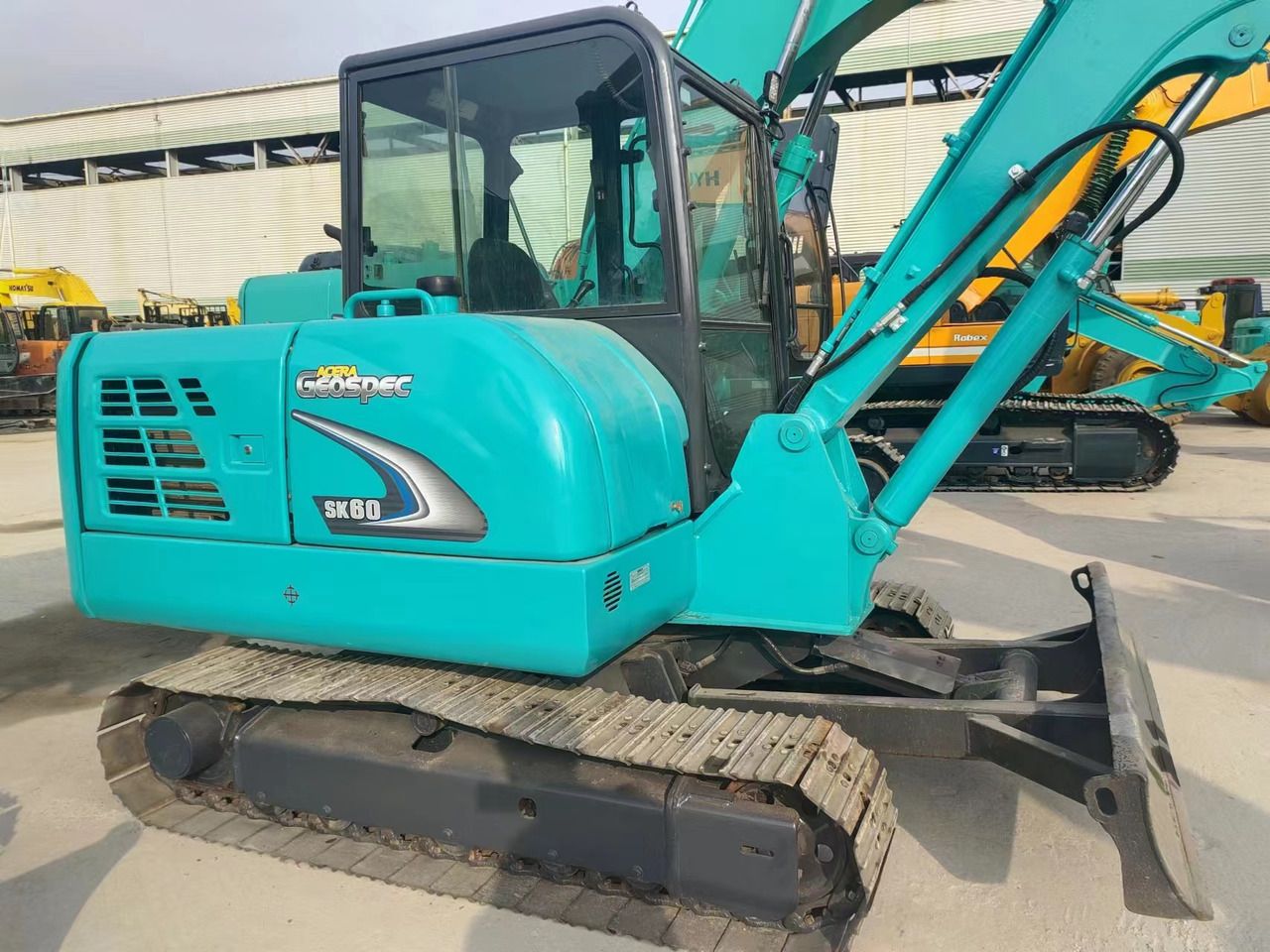 2020 Kobelco SK60-8 mini excavator side view 2020 Kobelco SK60-8 mini excavator side view