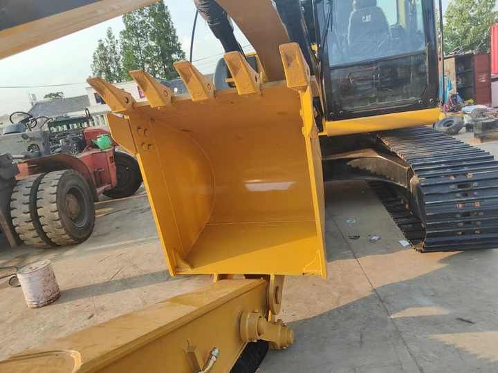 2022 Caterpillar 315D crawler excavator bucket and cab view 2022 Caterpillar 315D crawler excavator bucket and cab view
