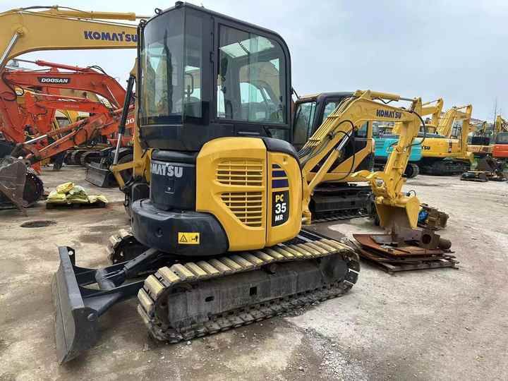 2021 Komatsu PC35 MR mini excavator, rear three-quarter view 2021 Komatsu PC35 MR mini excavator, rear three-quarter view