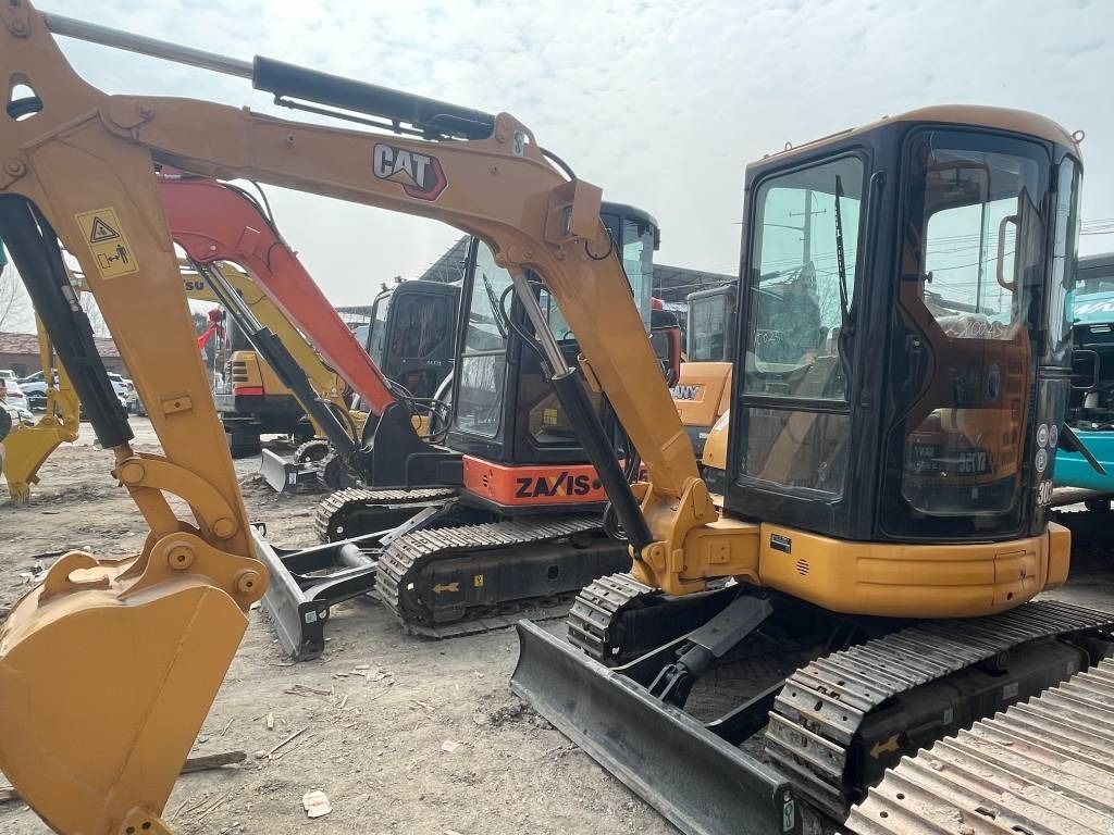 2024 Caterpillar 303.5 mini excavator, front three-quarter view 2024 Caterpillar 303.5 mini excavator, front three-quarter view