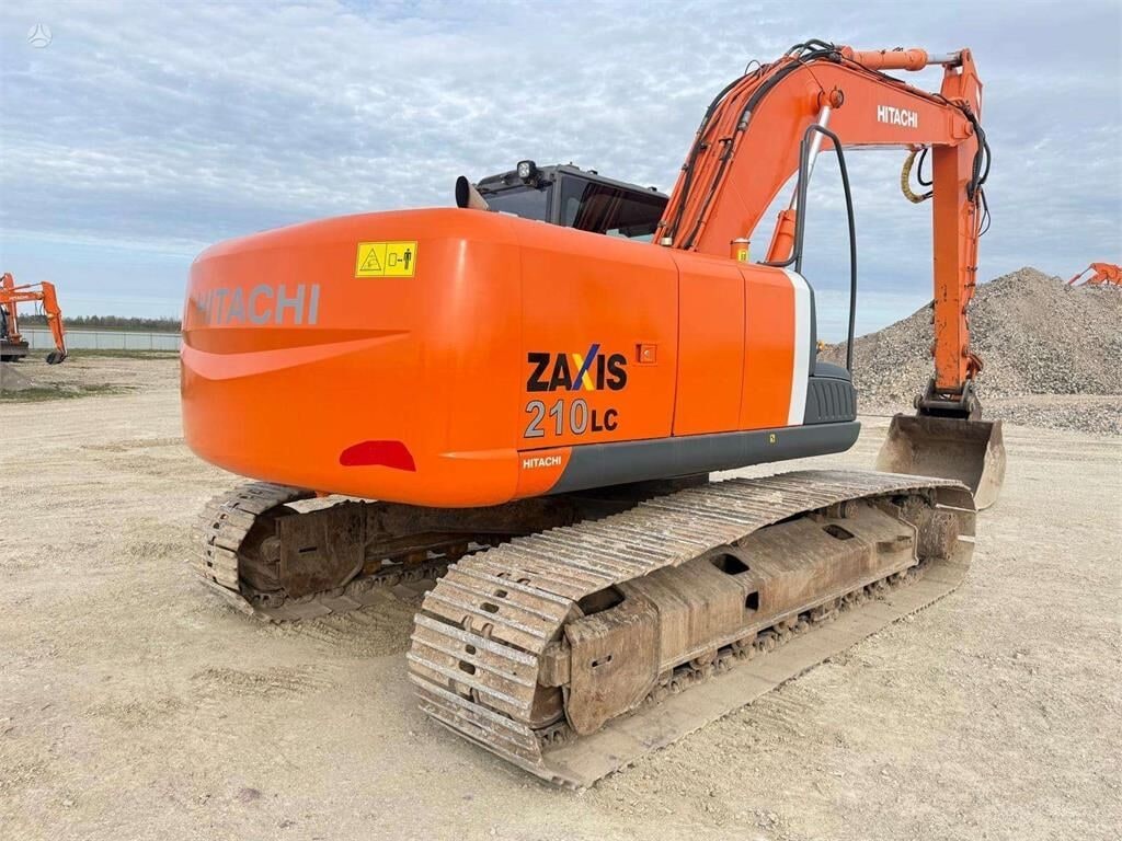 2009 Hitachi Zaxis 210LC crawler excavator, rear three-quarter view 2009 Hitachi Zaxis 210LC crawler excavator, rear three-quarter view