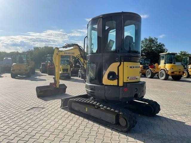 2014 New Holland E 29 B SR mini excavator, rear three-quarter view