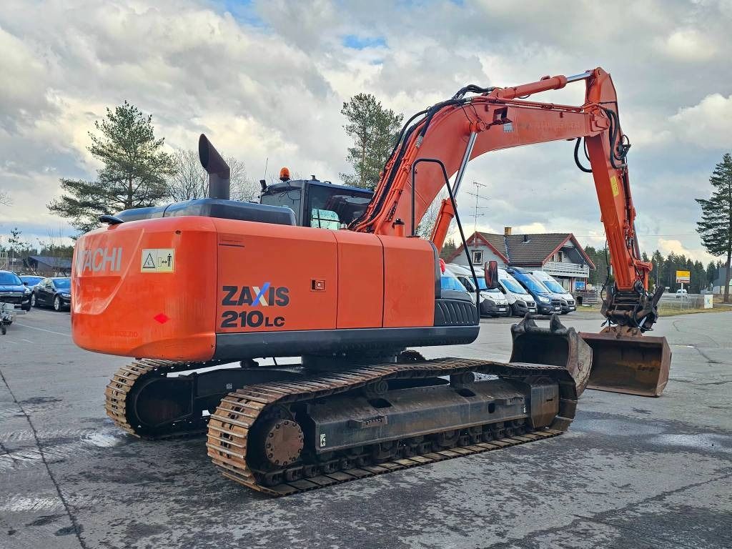 2014 Hitachi Zaxis 210LC crawler excavator, rear three-quarter view 2014 Hitachi Zaxis 210LC crawler excavator, rear three-quarter view