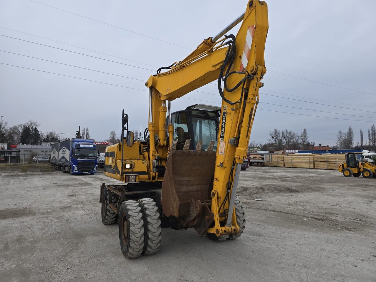 2007 JCB JS145W wheel excavator, front three-quarter view 2007 JCB JS145W wheel excavator, front three-quarter view