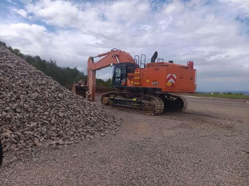 2023 Hitachi ZX690LCR-7 crawler excavator, rear three-quarter view 2023 Hitachi ZX690LCR-7 crawler excavator, rear three-quarter view