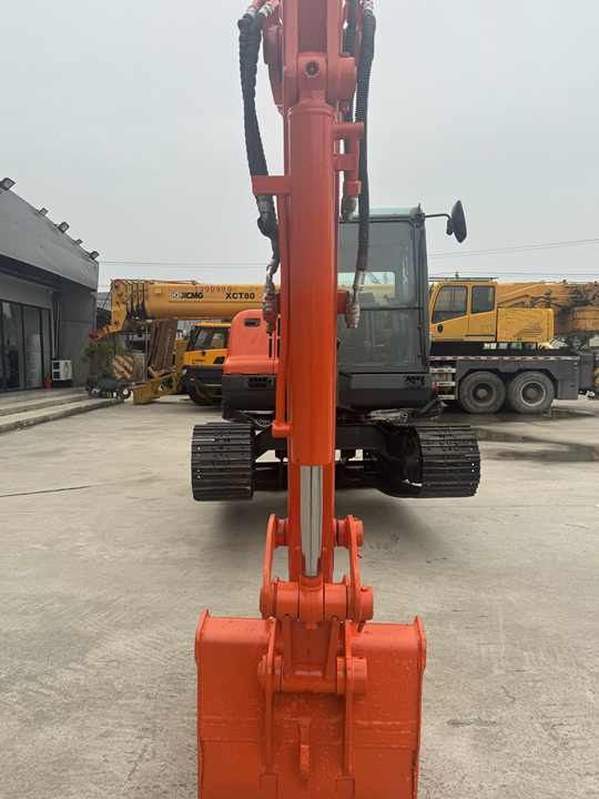 2018 Doosan DX60 crawler excavator, front view of boom and bucket