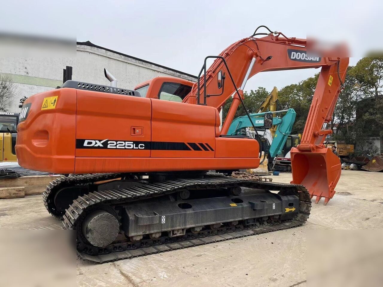 2024 Doosan DX225LC crawler excavator, side view 2024 Doosan DX225LC crawler excavator, side view