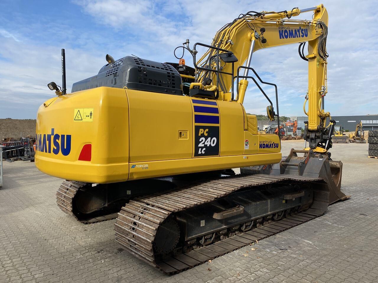 2023 Komatsu PC240LC-11 crawler excavator, rear three-quarter view