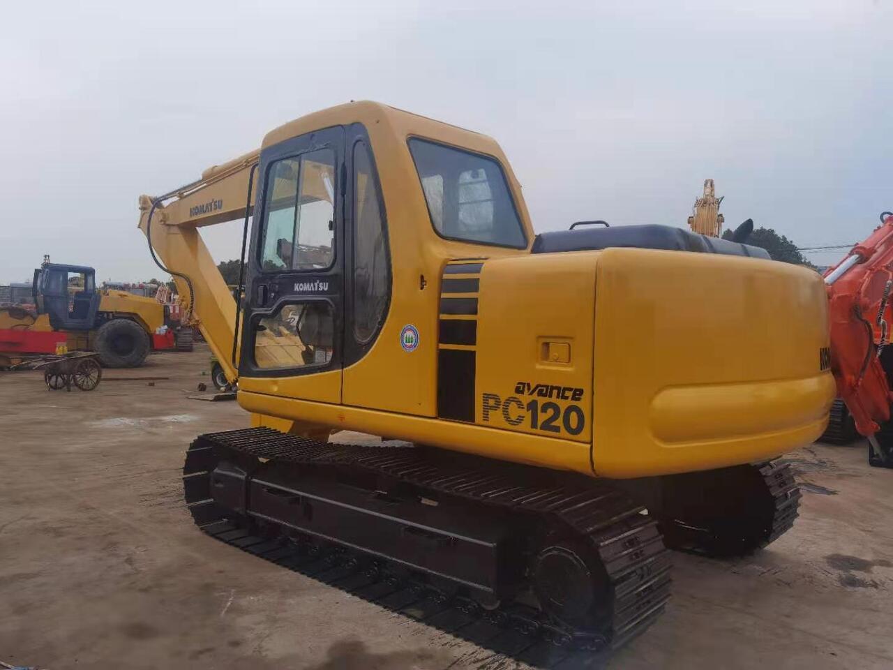 2008 Komatsu PC120-6 crawler excavator, rear three-quarter view 2008 Komatsu PC120-6 crawler excavator, rear three-quarter view