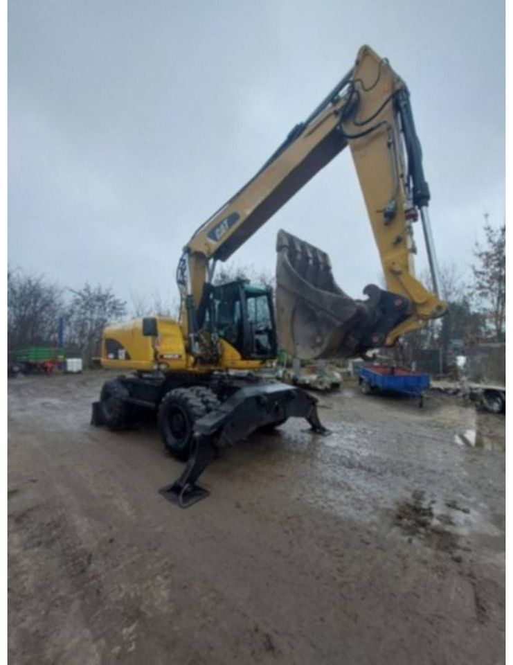 2007 Caterpillar M316D wheel excavator, side view 2007 Caterpillar M316D wheel excavator, side view
