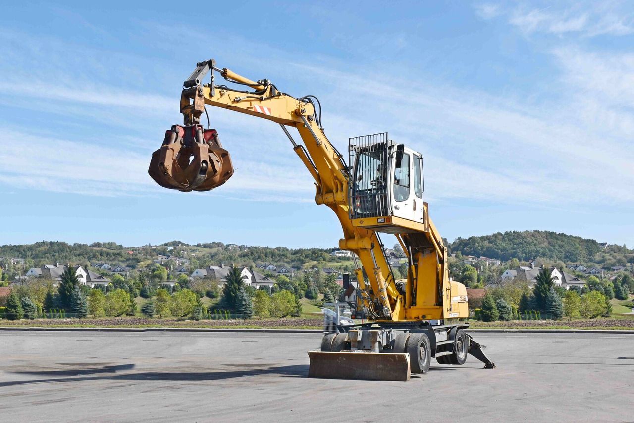 2008 Liebherr A316 material handler, side view 2008 Liebherr A316 material handler, side view