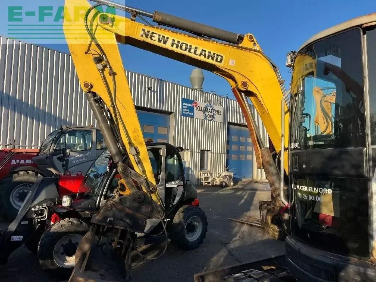 2012 New Holland E50 B SR mini excavator side view