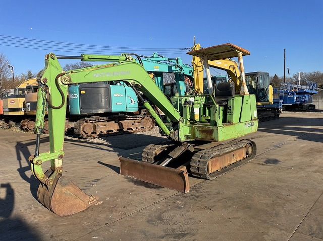 Mitsubishi ME30 mini excavator, side view
