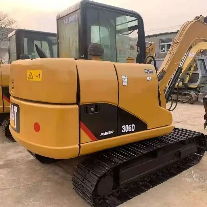 2023 Caterpillar 306D mini excavator, rear three-quarter view