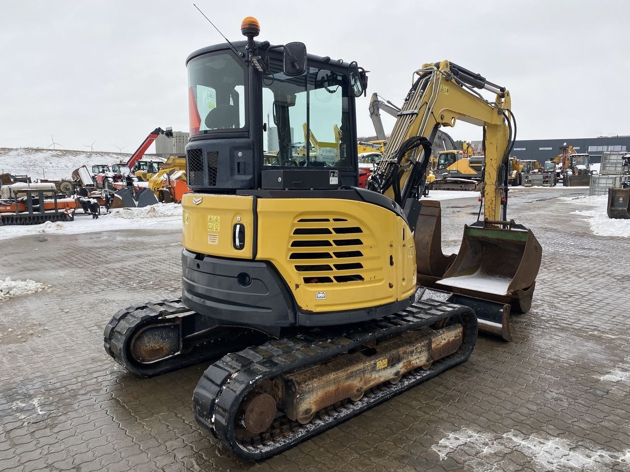2017 Yanmar VIO50-6 mini excavator, rear three-quarter view 2017 Yanmar VIO50-6 mini excavator, rear three-quarter view