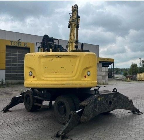 2015 Caterpillar 302.2 material handler, rear view 2015 Caterpillar 302.2 material handler, rear view