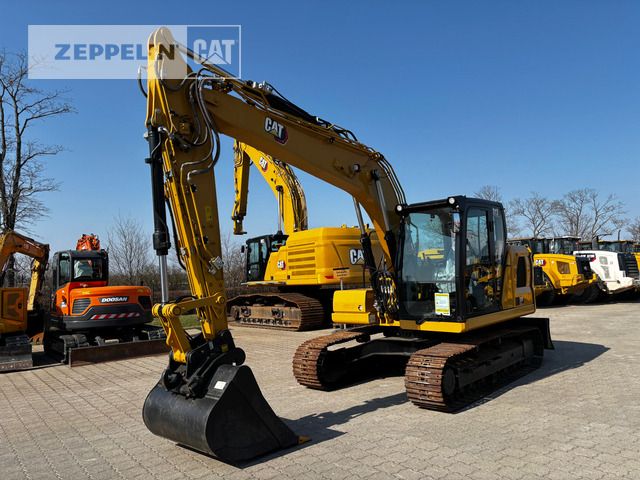 2021 Caterpillar 313-07B crawler excavator, front three-quarter view