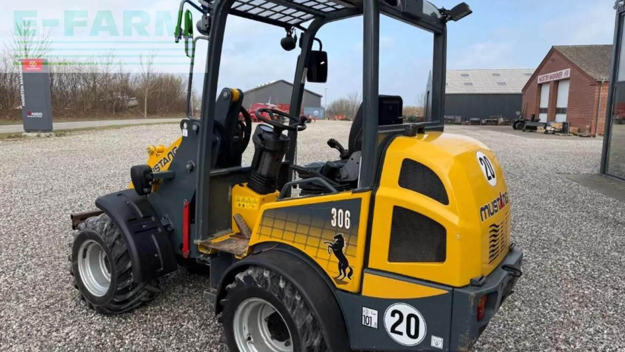 2014 Mustang AL 306 mini excavator, rear three-quarter view 2014 Mustang AL 306 mini excavator, rear three-quarter view