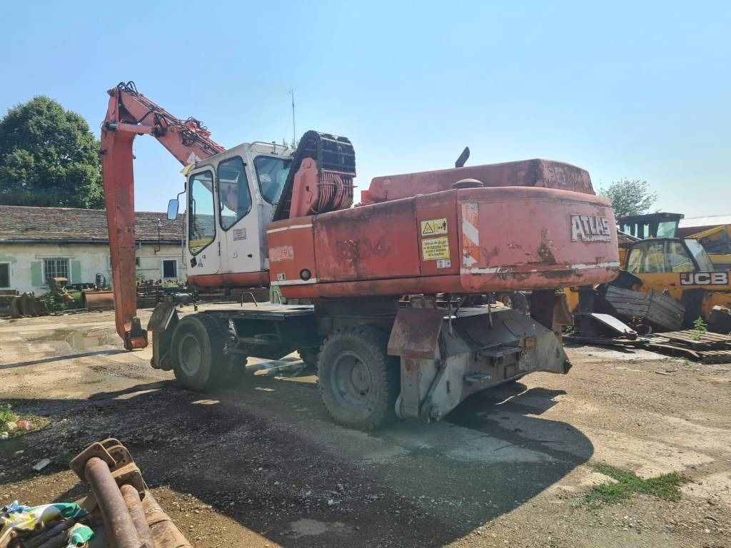 1996 Atlas 1804 material handler, rear three-quarter view