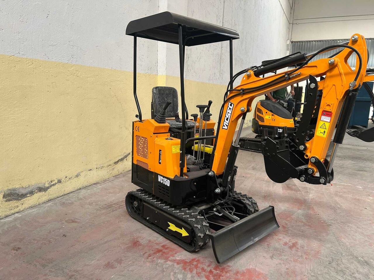 Vicsec VC15D mini excavator, side view