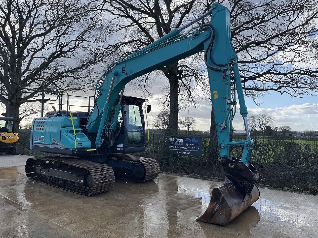 2023 Kobelco SK130LC-11 crawler excavator, side view 2023 Kobelco SK130LC-11 crawler excavator, side view