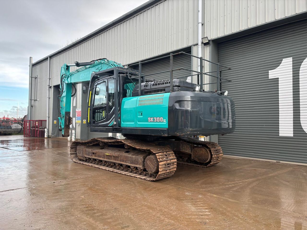 2022 Kobelco SK300LC-10E crawler excavator, rear three-quarter view 2022 Kobelco SK300LC-10E crawler excavator, rear three-quarter view