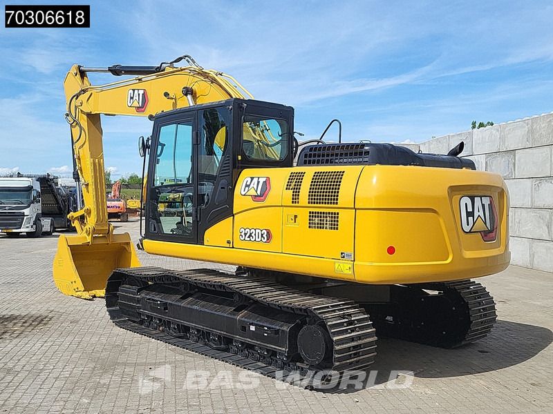 2025 Caterpillar 323D3 crawler excavator, rear three-quarter view