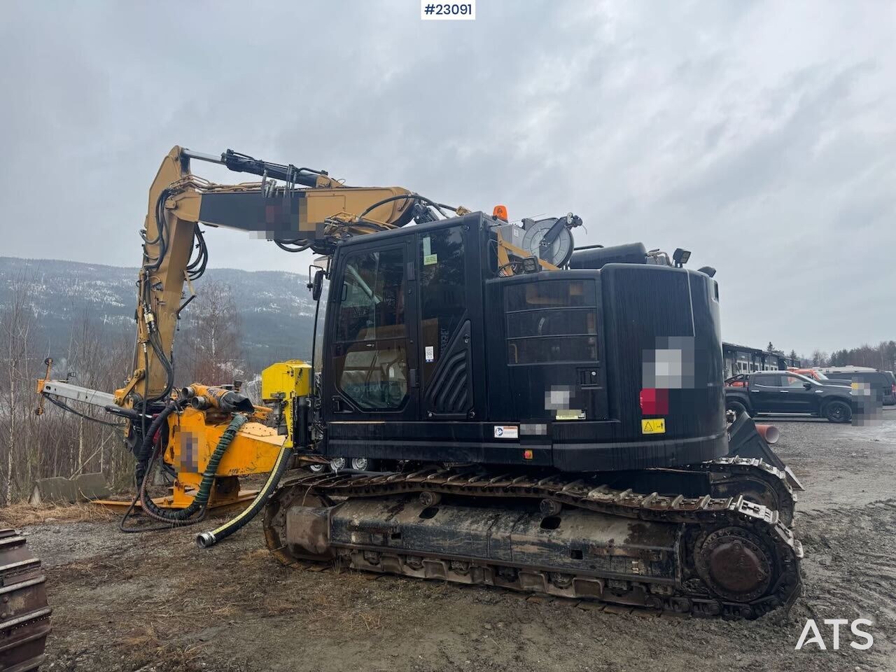 2017 Caterpillar 325FL crawler excavator, side view with drilling attachment 2017 Caterpillar 325FL crawler excavator, side view with drilling attachment