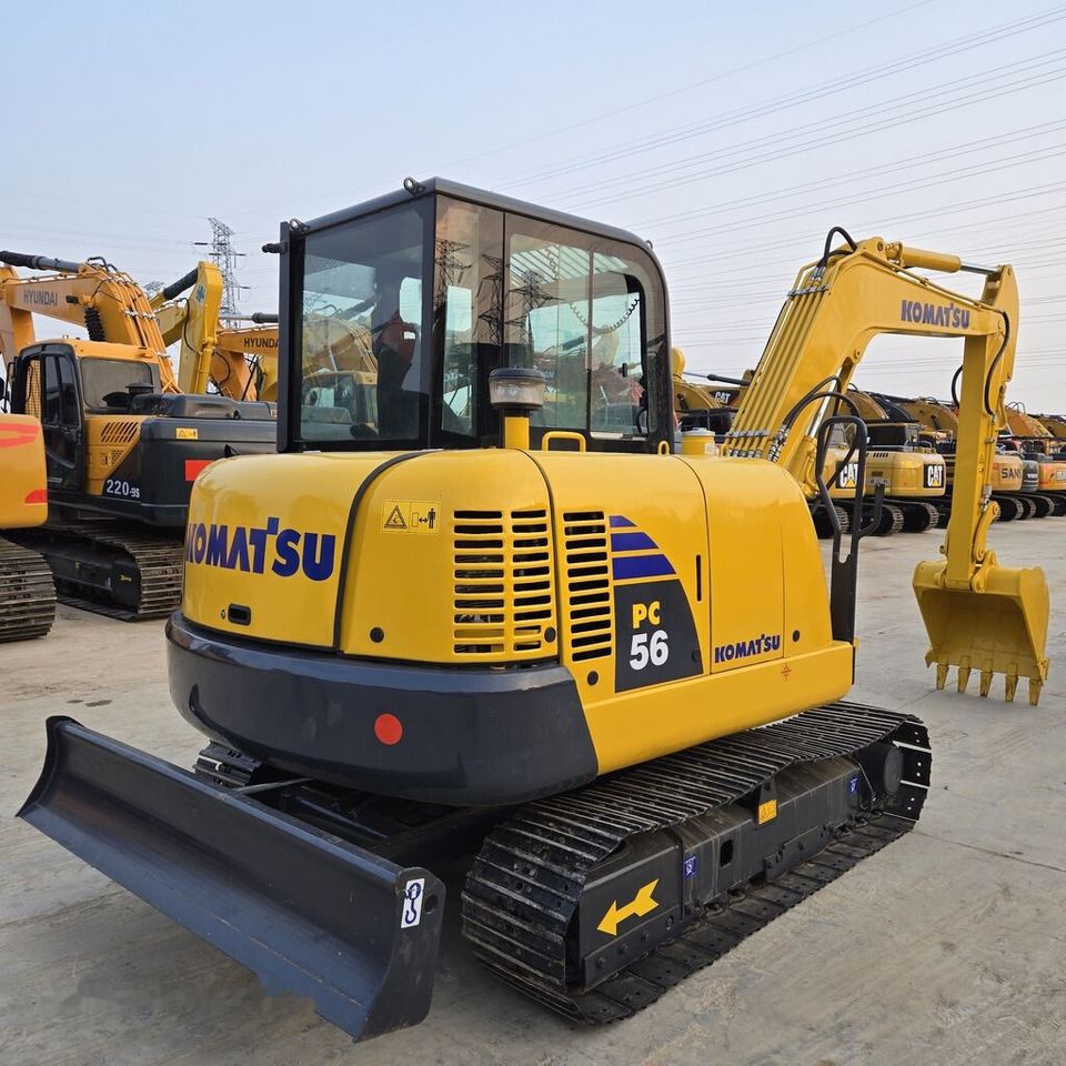2022 Komatsu PC56 mini excavator, rear three-quarter view 2022 Komatsu PC56 mini excavator, rear three-quarter view