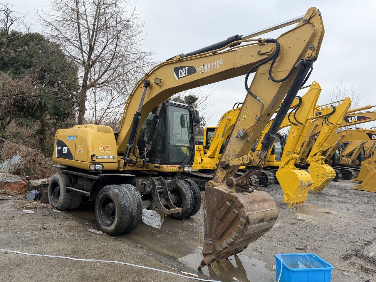 2018 Caterpillar M312D2 wheel excavator, side view 2018 Caterpillar M312D2 wheel excavator, side view