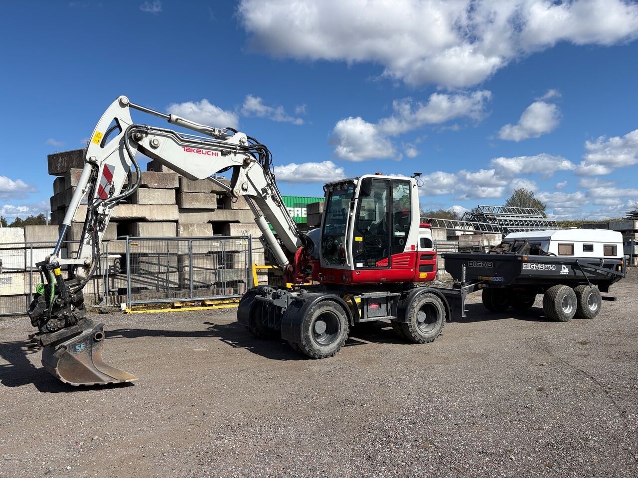 2024 Takeuchi TB395W wheeled excavator side view