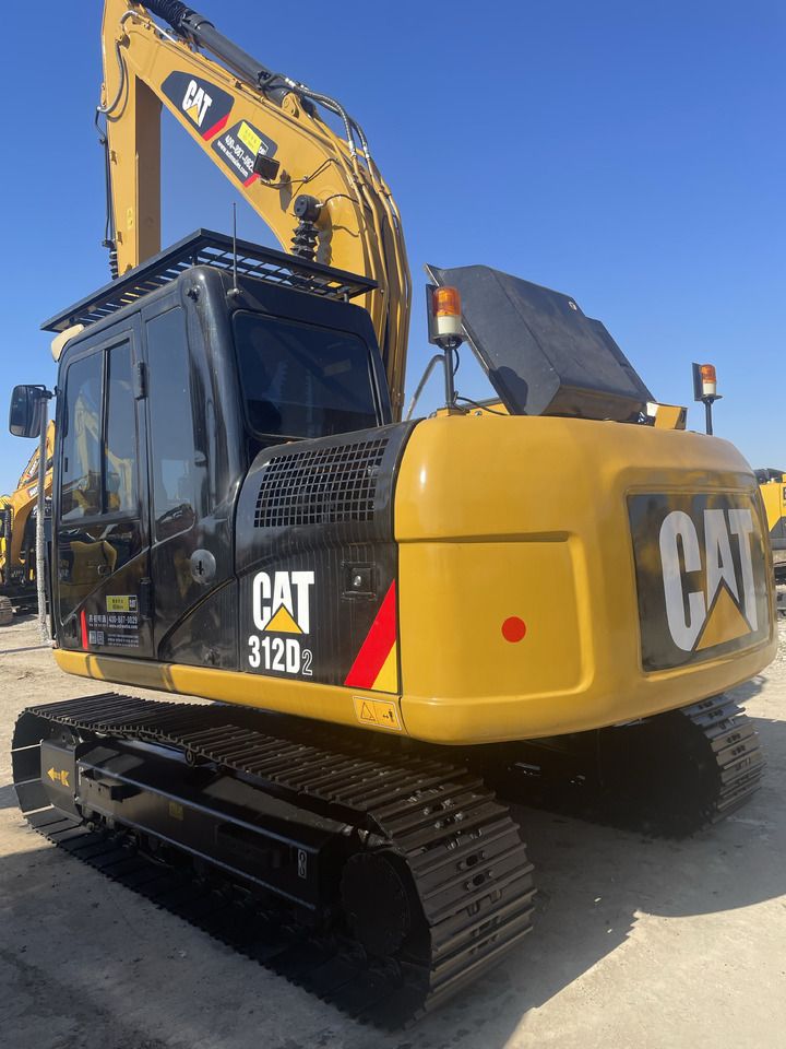 2024 Caterpillar 312D2 crawler excavator rear three-quarter view 2024 Caterpillar 312D2 crawler excavator rear three-quarter view
