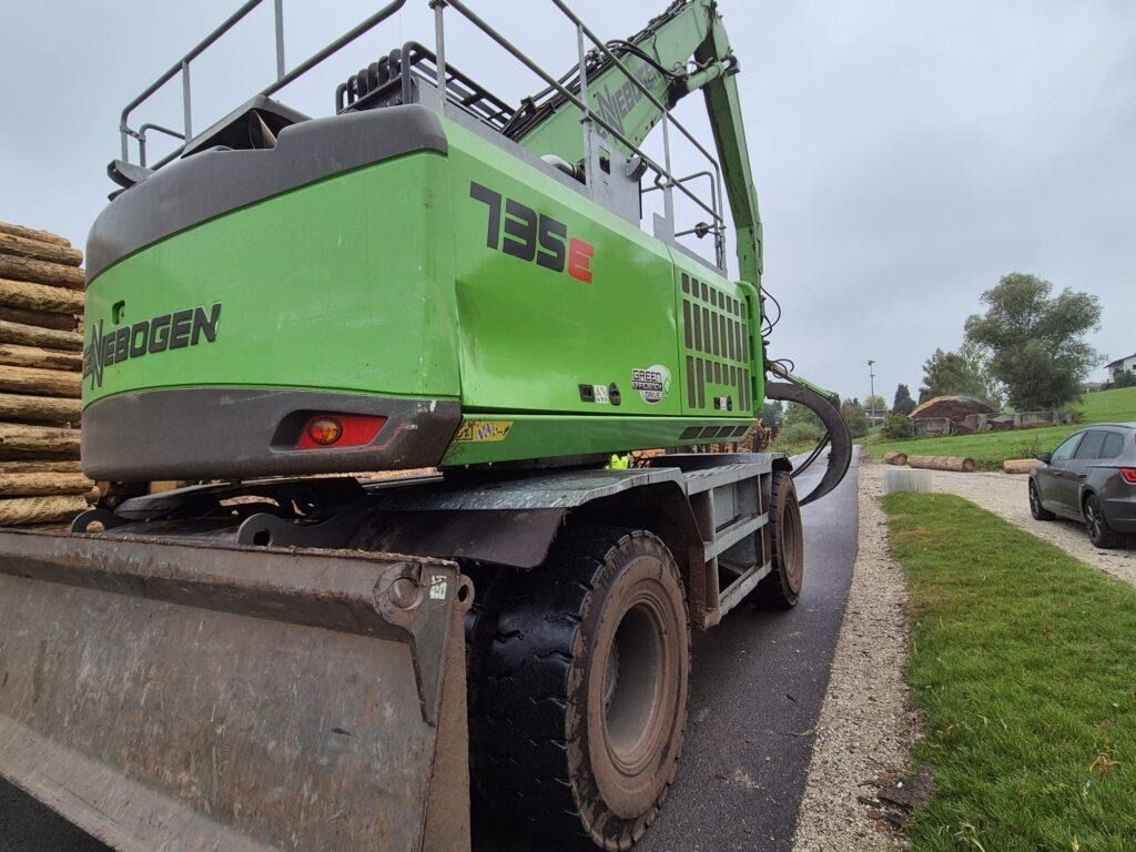 2022 Sennebogen 735M GED material handler, rear three-quarter view 2022 Sennebogen 735M GED material handler, rear three-quarter view