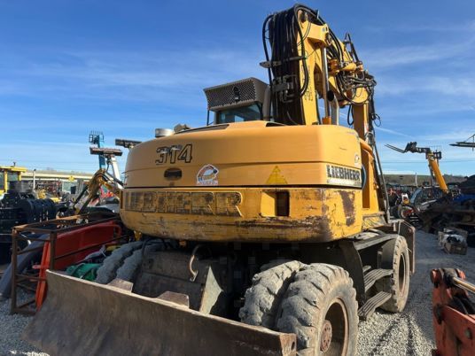 2006 Liebherr A314 wheel excavator rear view 2006 Liebherr A314 wheel excavator rear view
