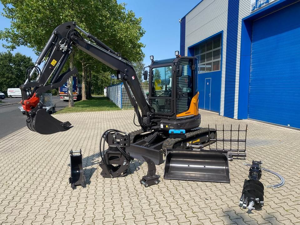 2026 Berger Kraus BK4000KJS mini excavator with attachments, side view 2026 Berger Kraus BK4000KJS mini excavator with attachments, side view